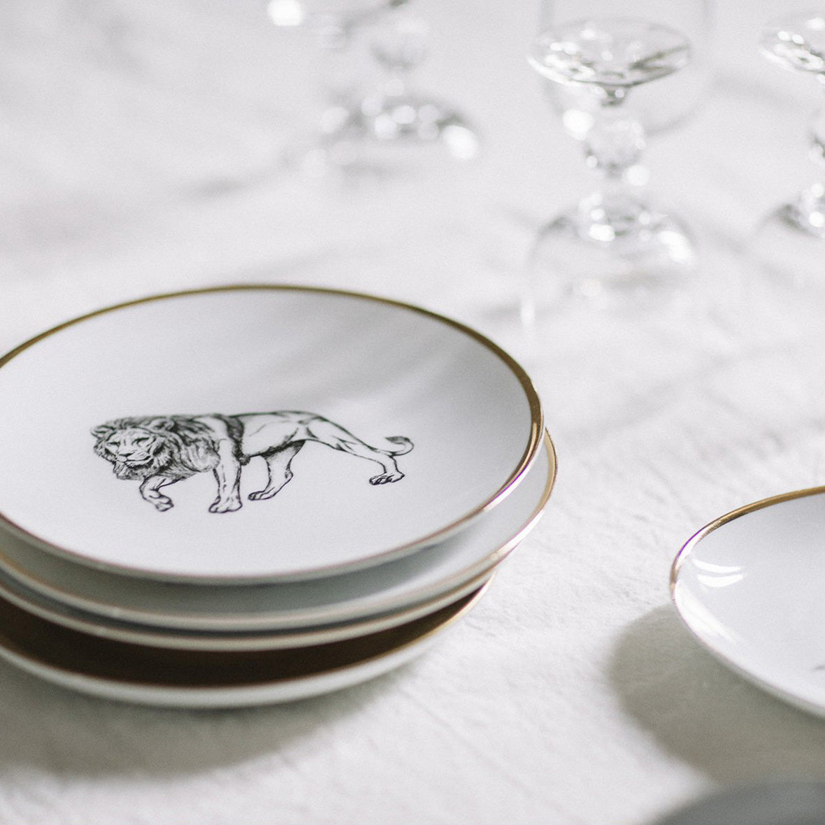 Plato de postre · Porcelana de Limoges · Diseño león